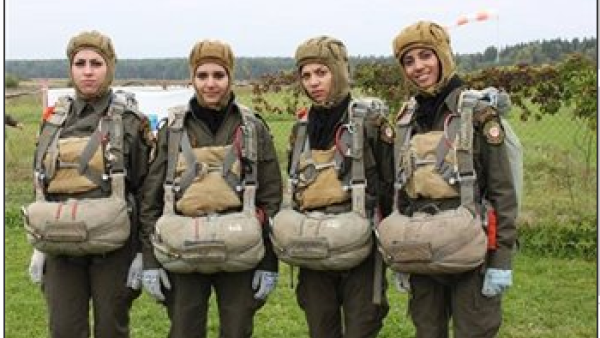 The Palestinian beauties (some looking happier than others) show off their paratrooper uniforms (Image courtesy of Maan News Agency) The Palestinian beauties (some looking happier than others) show off their paratrooper uniforms (Image courtesy of Maan News Agency)