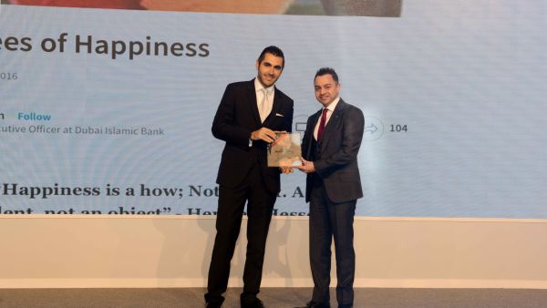 Dr. Adnan Chilwan, Group Chief Executive Officer at DIB, receiving the award Dr. Adnan Chilwan, Group Chief Executive Officer at DIB, receiving the award