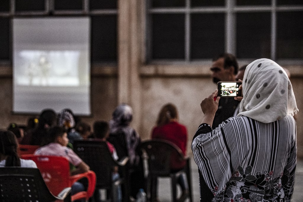 Mobile Cinema Brings Charlie Chaplin Pranks To Syria S Kurdish Children Al Bawaba