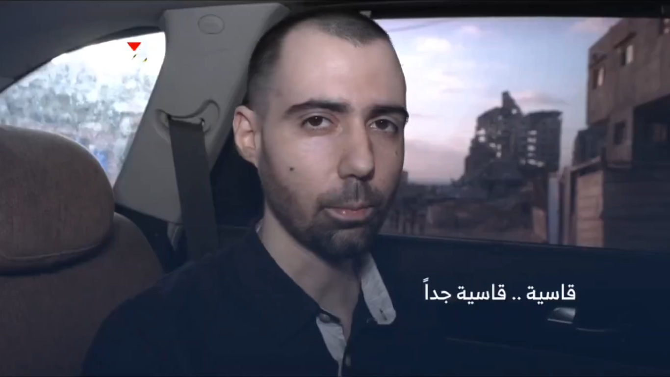 Israeli hostage seen in Al-Qassam video driving through Gaza during airstrikes