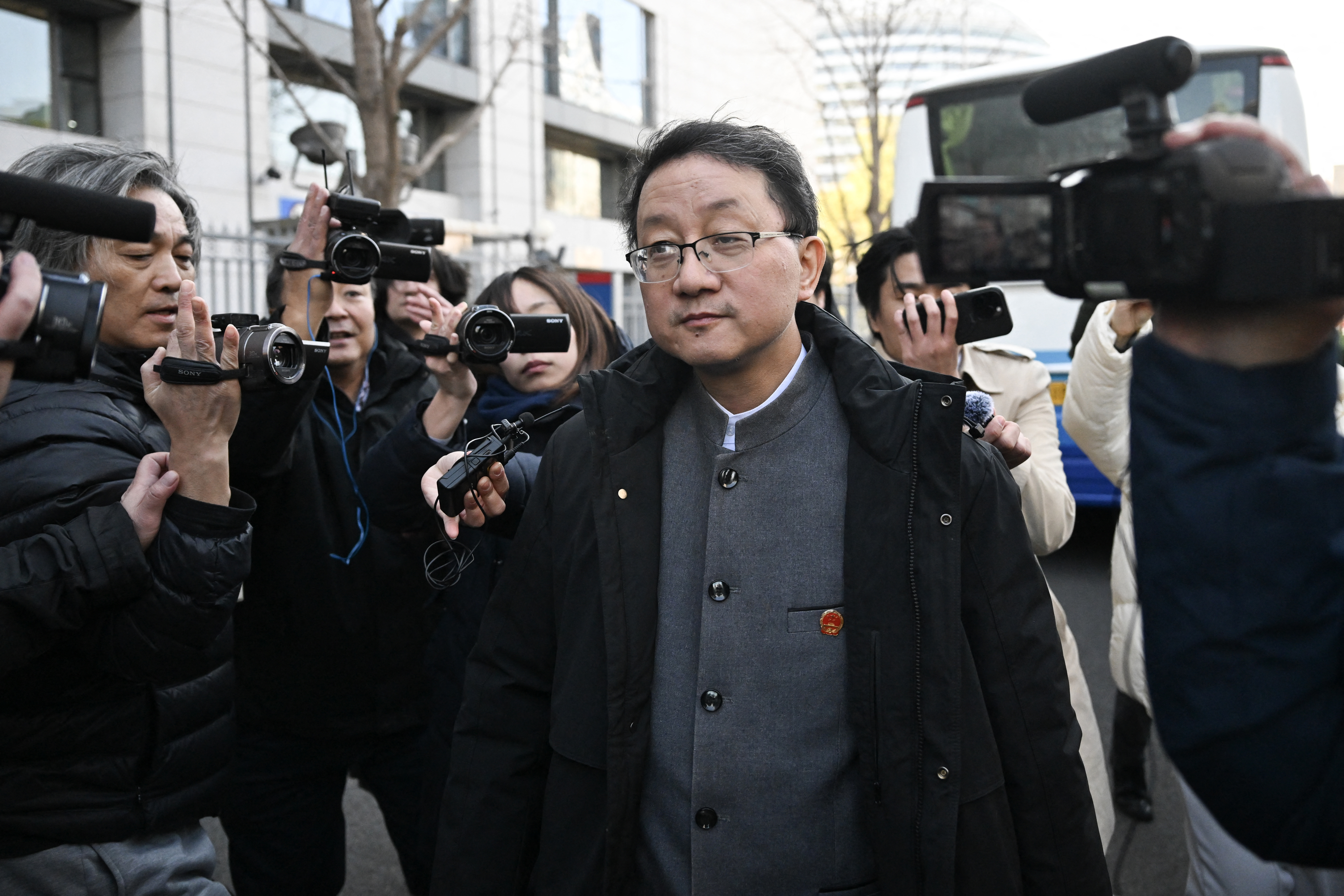 Japan urges its citizens in China to stay cautious as tensions with Beijing rise over Taiwan