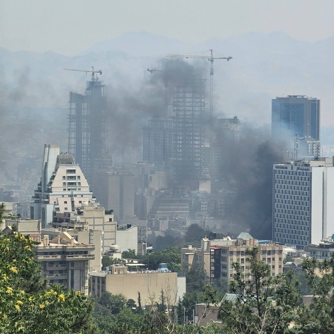 Fire erupts near Hotel Esteghlal in Iran