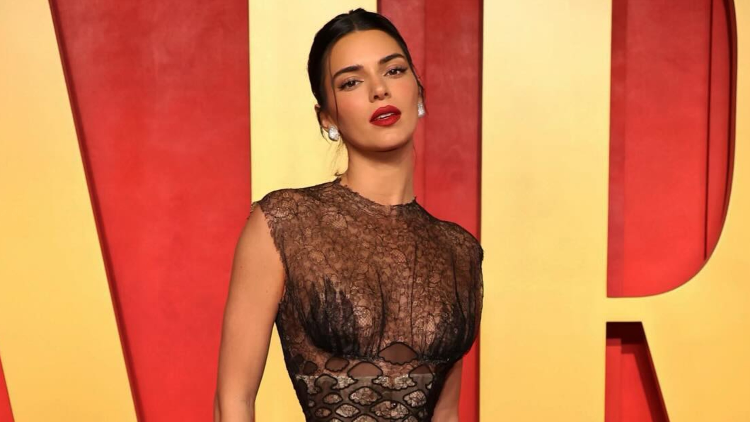 Kendall Jenner goes topless in tiny thong bikini bottoms