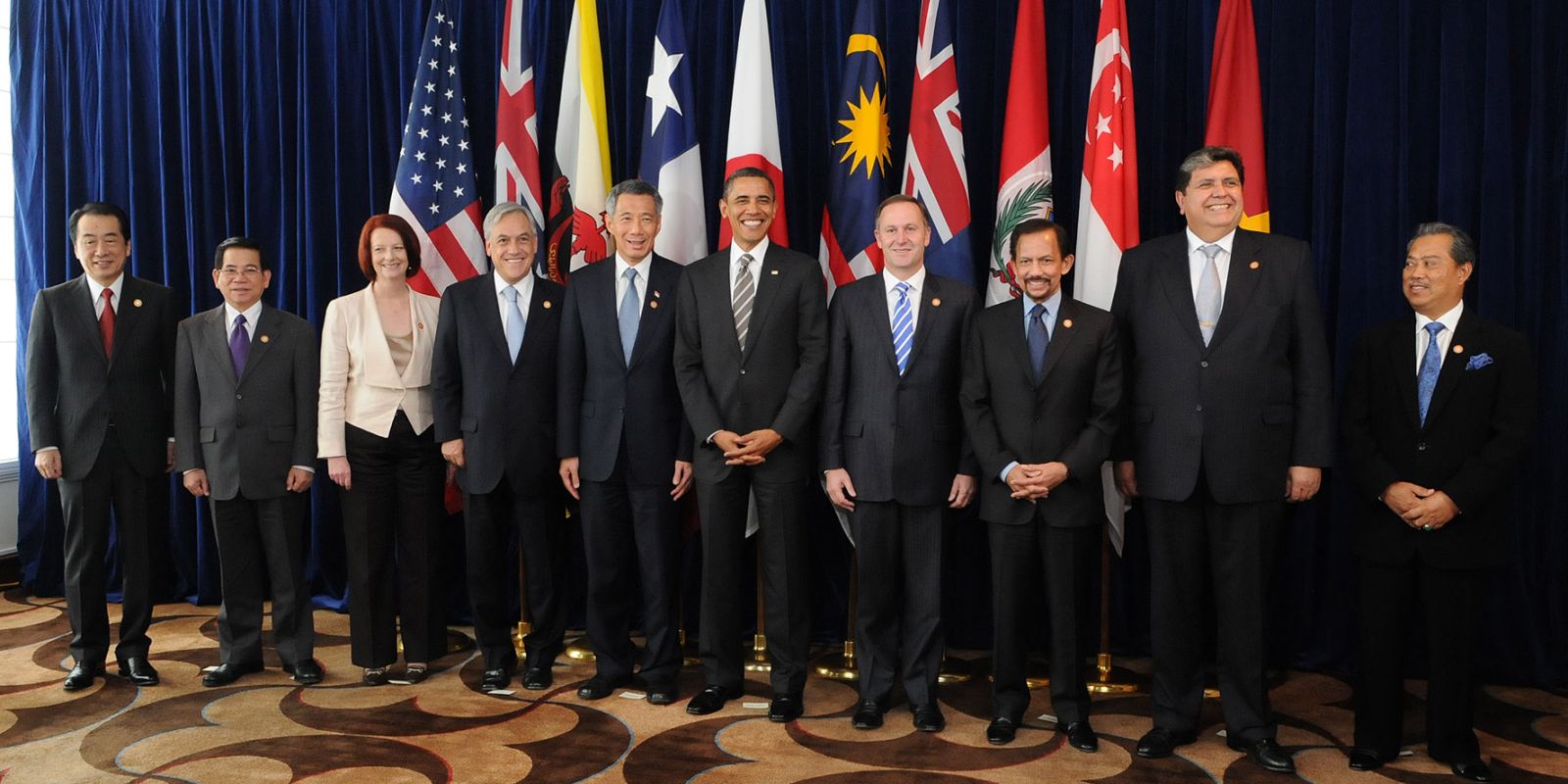 UK signs treaty to join trans-Pacific trade bloc