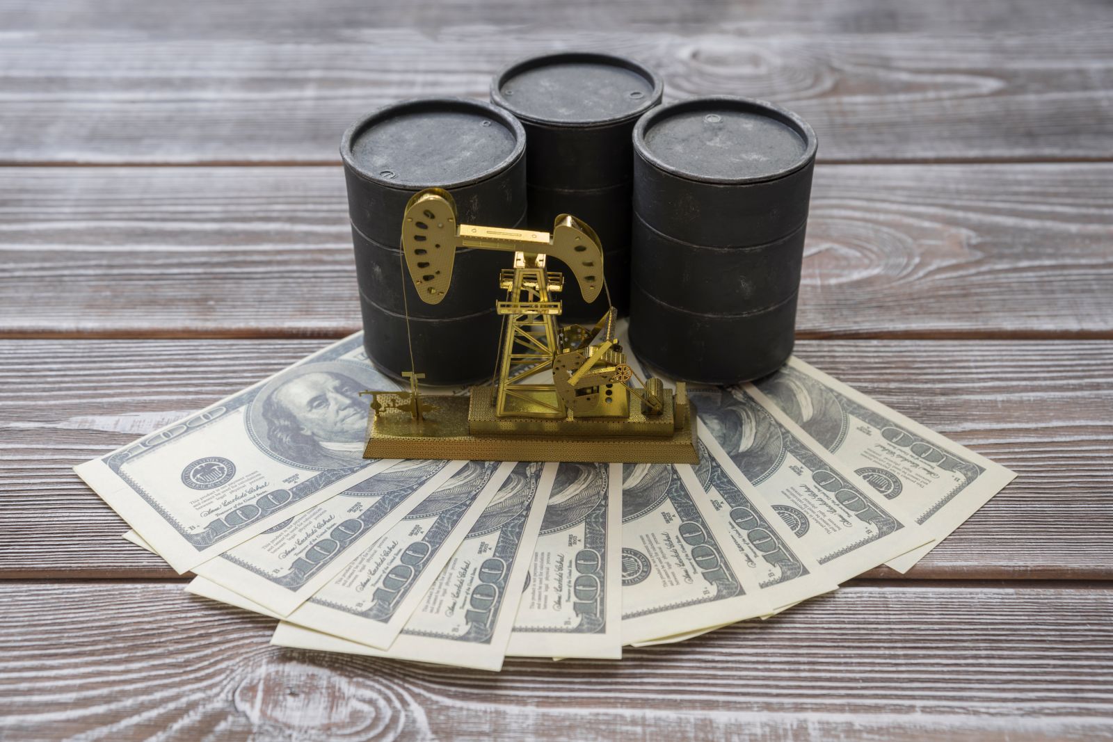 Oil prices slip on likely Fed, ECB rate hikes