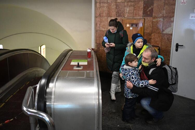 In Pictures: Ukrainians Flee, Take Shelter After Invasion 
