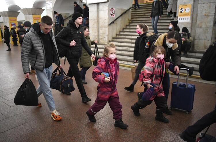 In Pictures: Ukrainians Flee, Take Shelter After Invasion 
