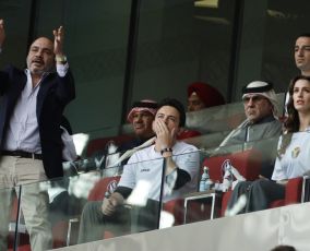 Jordanian crown prince Hussein and his uncle Prince Ali watching Jordan's football team play