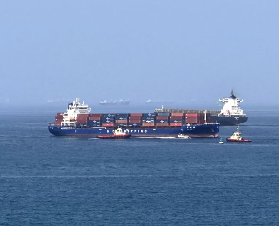 Foreign cargo ship runs aground in Strait of Hormuz as Iran defends shipping controls