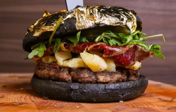 Artisanal black sandwich filled with meat burgers