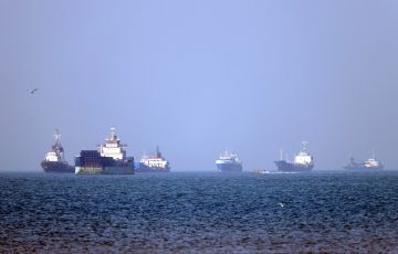 In this picture obtained from Iran's ISNA news agency on May 4, 2026, vessels are pictured anchored in the Strait of Hormuz off Bandar Abbas in southern Iran. Photo by AMIRHOSSEIN KHORGOOEI / ISNA / AFP