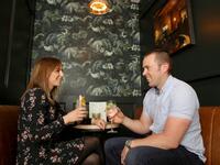 Customers Niamh and Padraic Minock enjoy their non-alcoholic drinks at the Virgin Mary pub, which opened recently selling non-alcoholic drinks and is known as the 'pub with no beer', in the city centre of Dublin on May 16, 2019. PAUL FAITH / AFP