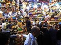 Yemenis shop for sweets and dried fruits in the capital Sanaa on May 28, 2019, during the holy Muslim month of Ramadan and ahead of Eid al-Fitr celebrations.  Mohammed HUWAIS / AFP