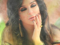 In her latest photos Fawakherji appeared in bright colored clothes and wavy hair Source sulaffawakherji Instagram