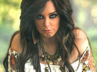 In her latest photos Fawakherji appeared in bright colored clothes and wavy hair Source sulaffawakherji Instagram