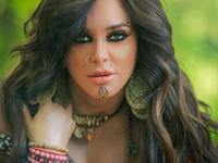 In her latest photos Fawakherji appeared in bright colored clothes and wavy hair Source sulaffawakherji Instagram