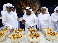 Emirati men check baskets of Dabas and Khalas dates during the annual Liwa Date Festival in the western region of Liwa on July 17, 2019. Karim SAHIB / AFP