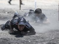 Palestinian military cadets take part in a training session organised by Hamas' military wing, the Ezzedin al-Qassam Brigades, in Gaza City on July 20, 2019.  MAHMUD HAMS / AFP
