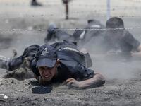 Palestinian military cadets take part in a training session organised by Hamas' military wing, the Ezzedin al-Qassam Brigades, in Gaza City on July 20, 2019.  MAHMUD HAMS / AFP