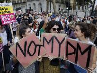 Demonstrators carry placards as they protest against Britain's newly appointed prime minister Boris Johnson outside Downing Street in London on July 24, 2019. Boris Johnson took charge as Britain's prime minister on Wednesday, on a mission to deliver Brexit by October 31 with or without a deal. Tolga AKMEN / AFP / POOL