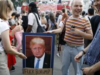 Demonstrators carry placards as they protest against Britain's newly appointed prime minister Boris Johnson outside Downing Street in London on July 24, 2019. Boris Johnson took charge as Britain's prime minister on Wednesday, on a mission to deliver Brexit by October 31 with or without a deal. Tolga AKMEN / AFP / POOL