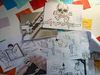 This picture shows illustrations by Syrian Cartoonist Amani al-Ali at her home studio in the city of Idlib in the eponymous northwestern province, including a drawing of a skull and crossbones with a caption below reading in Arabic "Syria welcomes you", and another of a woman being pulled from four sides by different men.  Omar HAJ KADOUR / AFP