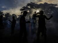 Catholic faithful light fireworks, during the opening of the ten-day celebration of the Santo Domingo de Guzman festival in Managua, on August 1, 2019.  INTI OCON / AFP