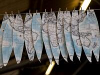 Hand-painted cartography on oval shaped strips called "gores" dry at the Bellerby and Co Globemakers' workshop and headquarters in Stoke Newington in north London, on July 19, 2019. Niklas HALLE'N / AFP