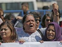 Palestinian women protest in support of women’s rights outside the prime minister’s office in the West Bank city of Ramallah on September 2, 2019, after a young Palestinian died in a case that has raised emotions. ABBAS MOMANI / AFP