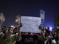 Egyptian protesters shout slogans as they take part in a protest calling for the removal of President Abdel Fattah al-Sisi in Cairo's downtown on September 20, 2019.STR / AFP