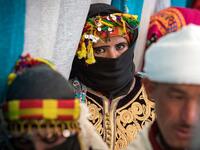 Young Amazigh (Berber) men and women wait for their wedding ceremony during the annual "Engagement Moussem" festival near the village of Imilchil in central Morocco's high Atlas Mountains on September 21, 2019. Each year in the High Atlas Mountains hamlet of Ait Amer, tribes celebrate with dances and music, the collective wedding of young Amazigh couples during the traditional festival of "Engagement Moussem". FADEL SENNA / AFP