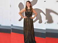 Lebanese presenter and producer Raya Abi Rached wore a dress by Amanda Wakeley