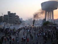 Iraqi protesters gather during a demonstration against state corruption, failing public services and unemployment at Tayaran square in Baghdad on October 2, 2019. Iraq's president and the United Nations urged security forces to show restraint after two protesters were killed in clashes with police that other top officials blamed on "infiltrators." AHMAD AL-RUBAYE / AFP