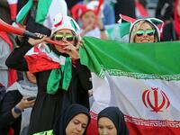 The Islamic republic has barred female spectators from football and other stadiums for around 40 years, with clerics arguing they must be shielded from the masculine atmosphere and sight of semi-clad men. Women fans are attending the football match freely for the first time in decades, after FIFA threatened to suspend the country over its controversial male-only policy.  ATTA KENARE / AFP