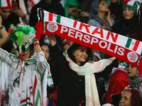 The Islamic republic has barred female spectators from football and other stadiums for around 40 years, with clerics arguing they must be shielded from the masculine atmosphere and sight of semi-clad men. Women fans are attending the football match freely for the first time in decades, after FIFA threatened to suspend the country over its controversial male-only policy.  ATTA KENARE / AFP