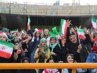 The Islamic republic has barred female spectators from football and other stadiums for around 40 years, with clerics arguing they must be shielded from the masculine atmosphere and sight of semi-clad men. Women fans are attending the football match freely for the first time in decades, after FIFA threatened to suspend the country over its controversial male-only policy.  ATTA KENARE / AFP