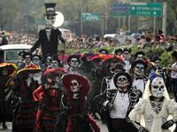 People take part in the Day of the Dead parade in Mexico City Ulises Ruiz/AFP/Getty Images