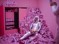 Manfred Dederl is being photographed at the "Supercandy Pop-Up Museum Vol. 2" in Cologne, western Germany on November 1, 2019. It is an interactive museum and offers a photo backdrop for social media at 25 stations. INA FASSBENDER / AFP