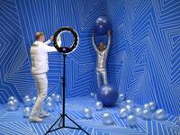 Manfred Dederl (R) is being photographed at the "Supercandy Pop-Up Museum Vol. 2" in Cologne, western Germany on November 1, 2019. It is an interactive museum and offers the perfect photo backdrop for social media at 25 stations. INA FASSBENDER / AFP