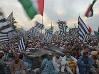 Activists of Islamic political party Jamiat Ulema-e-Islam (JUI) gather during an anti-government "Azadi (Freedom) March" in Islamabad on November 2, 2019. Tens of thousands of Islamists rallied alongside opposition supporters in Pakistan's capital Friday, as the firebrand cleric leading the protests called on Prime Minister Imran Khan's government to step down within 48 hours. FAROOQ NAEEM / AFP