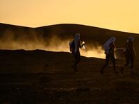Women take part in the desert trek "Rose Trip Maroc", on November 3, 2019 in the erg Chebbi near Merzouga. The Rose Trip Maroc is a female-oriented trek where teams of three must travel through the southern Moroccan Sahara desert with a compass, a map and a topographical reporter. JEAN-PHILIPPE KSIAZEK / AFP