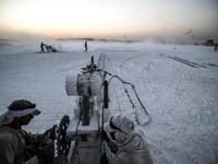 Labourers work at the "White Mountain" limestone extraction quarry site near Egypt's southern city of Minya, some 265 kilometres south of the capital, on November 13, 2019. Covered in fine white dust, labourers at the so-called "White Mountain" off Minya toil in shifts amidst brutal conditions with little workplace safety for paltry pay. They handle dangerous machinery with finesse, and shrug off the dangers of a job where a mistake can prove fatal. Khaled DESOUKI / AFP