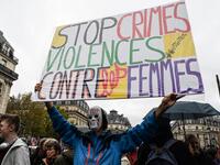 French activist Jean-Baptiste Redde, aka Voltuan, holds up a placard reading " Stop crimes against the women" as he takes part in a protest during the International day for elimination of violence against women in Paris, on November 23, 2019. DOMINIQUE FAGET / AFP