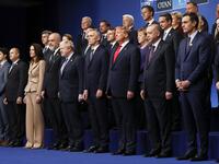 Nato heads of government (front row L-R): Canada's Prime Minister Justin Trudeau, Bulgaria's President Rumen Radev, Belgium's Prime Minister Sophie Wilmes, Albania's Prime Minister Edi Rama, Britain's Prime Minister Boris Johnson, NATO Secretary General Jens Stoltenberg, US President Donald Trump, Turkey's President Recep Tayyip Erdogan, Spain's Prime Minister Pedro Sanchez, Slovenia's Prime Minister Marjan Sarec, (middle row L-R) Croatia's Prime Minister Andrej Plenkovic, Denmark's Prime Minister Mette Fre