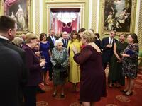 Britain's Queen Elizabeth II (C) talks with guests in Buckingham Palace in central London on December 3, 2019, during a reception hosted by Britain's Queen Elizabeth II ahead of the NATO alliance summit. NATO leaders gather Tuesday for a summit to mark the alliance's 70th anniversary but with leaders feuding and name-calling over money and strategy, the mood is far from festive. Geoff Pugh / POOL / AFP
