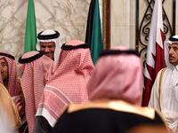 Abdullah bin Nasser bin Khalifa al-Thani (R), Qatar's Prime Minister, looks on as other delegates of the Gulf Cooperation Council (GCC) summit chat with each other, in the Saudi capital Riyadh on December 10, 2019. Fayez Nureldine / AFP