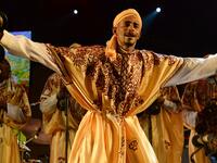 In this file photo taken on June 14, 2014 a member of Gnaoua (Gnawa) group Maalem Mohamed Kouyou performs in Essaouira at the Gnaoua World Music Festival. Gnawa culture, a centuries-old Moroccan practice rooted in music, African rituals and Sufi traditions, was on December 12, 2019 added to UNESCO's list of Intangible Cultural Heritage of Humanity. Fadel SENNA / AFP