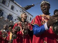 African rituals and Sufi traditions, was added to UNESCO's list of Intangible Cultural Heritage of Humanity earlier in the week. Gnawa refers to a "set of musical productions, fraternal practices and therapeutic rituals where the secular mixes with the sacred", according to the nomination submitted by Morocco. Often dressed in colourful outfits, Gnawa musicians play the guenbri, a type of lute with three strings, accompanied by steel castanets called krakebs. FADEL SENNA / AFP
