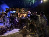 Volunteers set nativity figures at the 43rd edition of the "Presepio of Cavallermaggiore", a 300sqm Christmas Nativity crib in the Oratorio San Michele on December 20, 2019 in Cavallermaggiore, near Cuneo, Northwestern Italy. The "Presepio" is made by ten volunteers who every year spend 3 months to build a new edition with hundred of figures. MARCO BERTORELLO / AFP