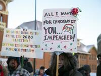 Anti-Trump protesters gather outside at Monument Park on December 18, 2019 in Battle Creek, Michigan. The full House of Representatives is voting on two articles of impeachment against President Donald Trump. Nuccio DiNuzzo/Getty Images/AFP